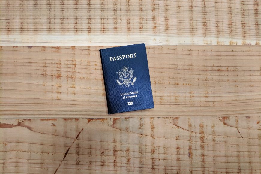 passport on wooden background