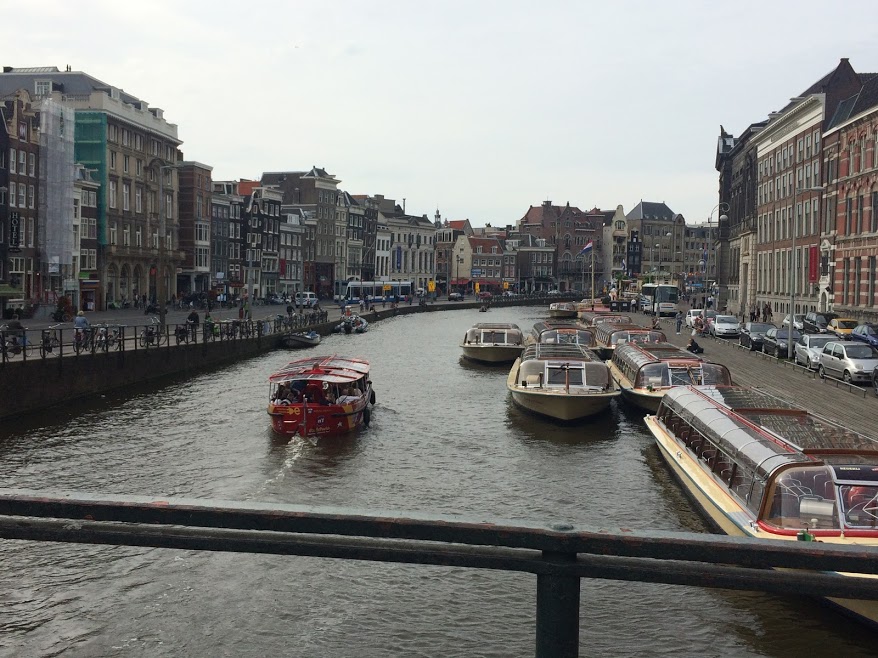 Boats in the canal in Amsterdam