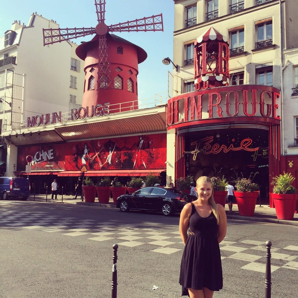 Woman in front of Moulin Rouge