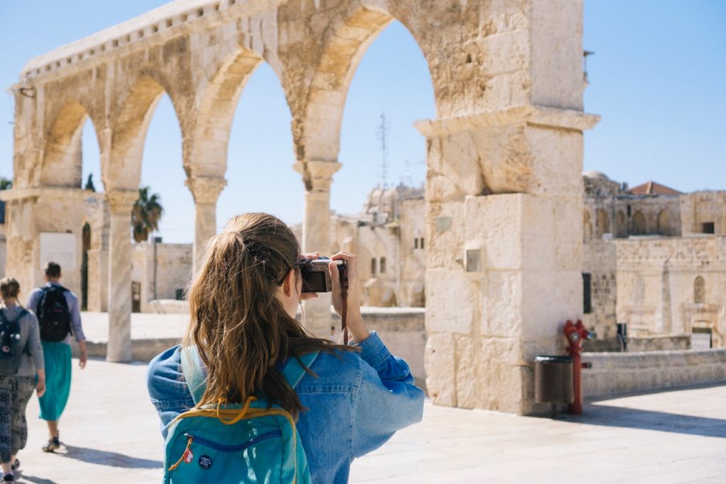 Woman taking a photograph