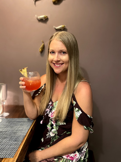 Woman holding a cocktail